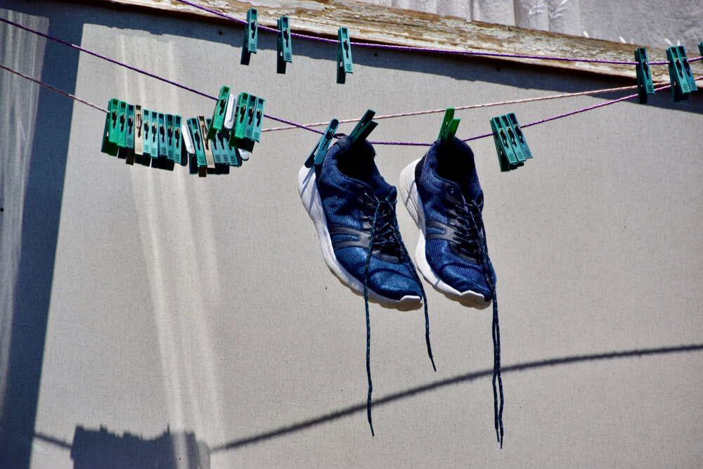 shoes drying on a line